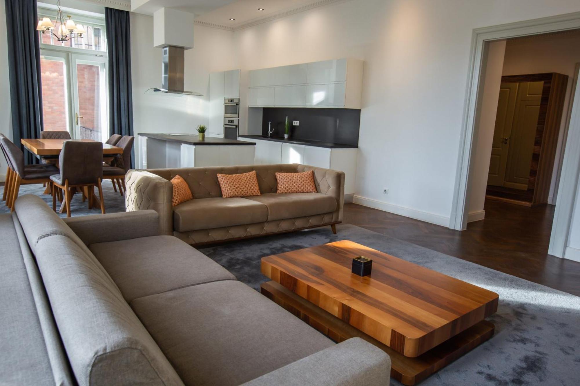 Zoya Luxury Residence Budapest Eksteriør bilde A living room in a serviced apartment in Amsterdam, Netherlands